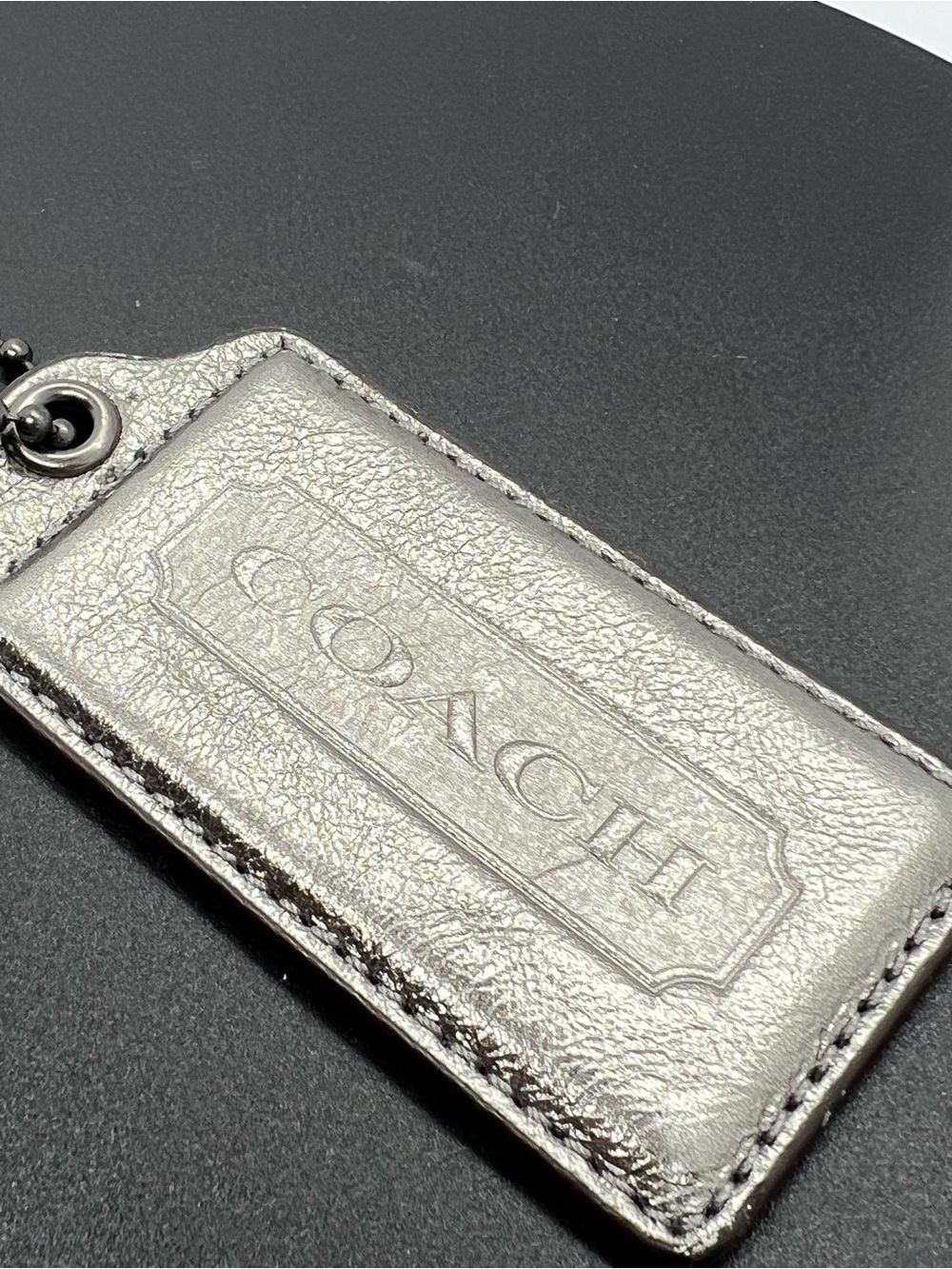Coach Metallic Silver Leather Keychain Tag
